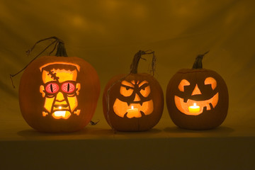 three jack-o-lanterns