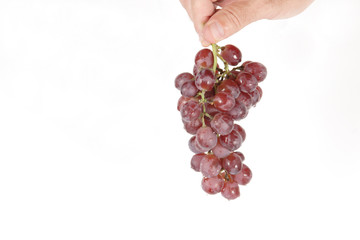hung grapes for a hand