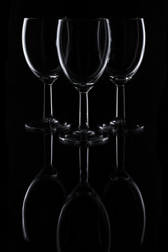 three glasses on black