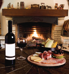 wine bottle with red wine glass