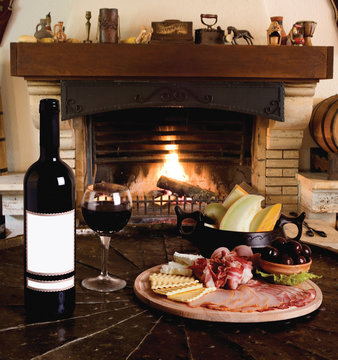 wine bottle with red wine glass