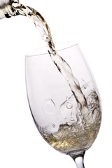 wine being poured in a glass