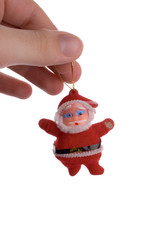 man holding mini santa claus