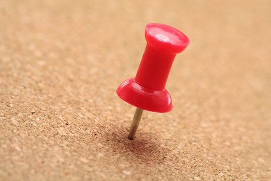 Red Pushpin And Corkboard