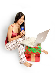 girl on laptop with credit card