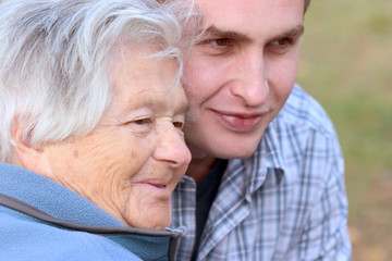 elderly person and grandson