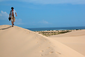 walking across the sand dunes