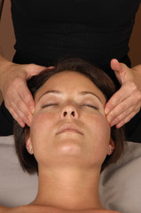 Fototapeta na wymiar massaging temples at day spa salon