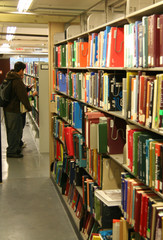 students among bookshelves