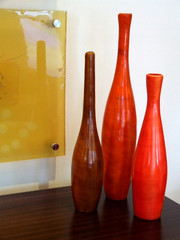 three red vases