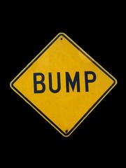yellow bump sign
