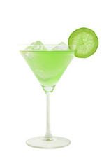 green cocktail with slice of lime and ice cubes