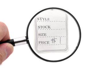 price tag and magnifier