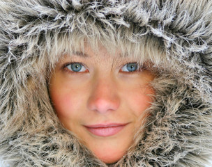 beaytiful girl with blue eyes in fur hood