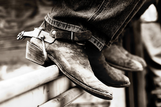 row of rodeo boots & spurs