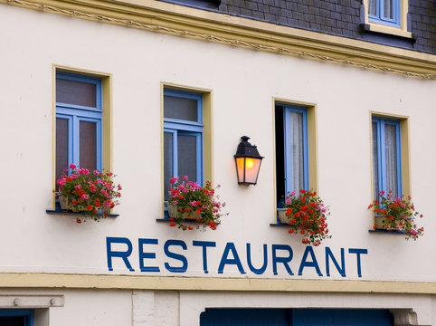 restaurant in french town with restaurant written
