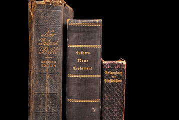 three very old bibles including two german bibles