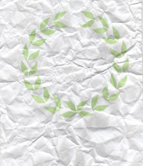 wrinkled paper with olive leaves printed