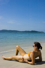 Fototapeta na wymiar sunbathing woman portrait
