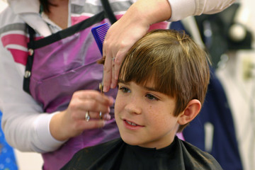 boy getting haircut