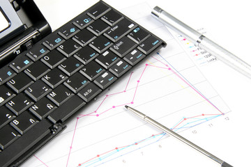pda and keyboard with chart
