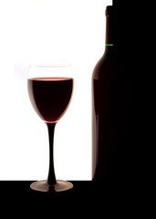 glass with a wine and a bottle.