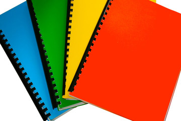 bright colored books isolated on white
