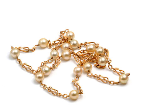 gold bracelet with pearls in the white
