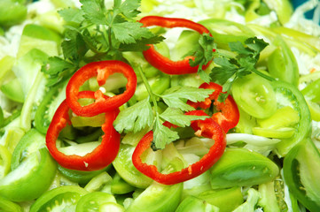shredded herbs and red peppers