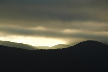 mountain silhouette in storm