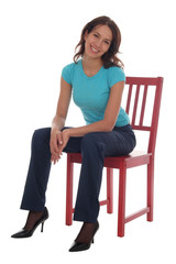 young woman sitting on chair