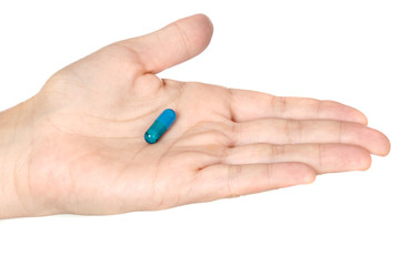 Fototapeta premium hand with a pill