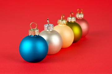 some coloured christmas balls