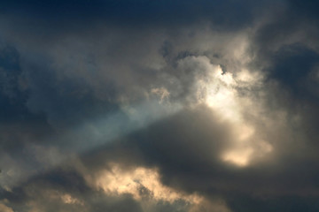 Fototapeta na wymiar rays and clouds