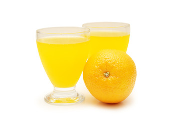 two glasses of juice and orange isolated on white