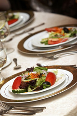 wedding tables with green salad