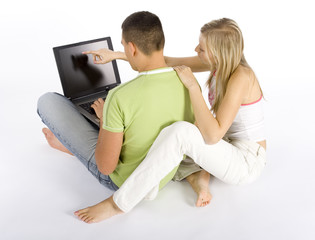 young couple with laptop