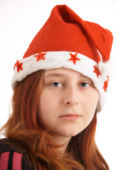 red-haired girl in the christmas cap