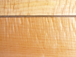 tiger maple and herringbone background