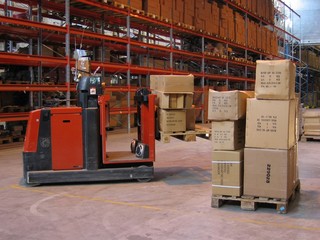 truck and pallets in a warehouse