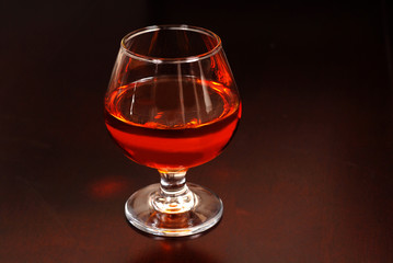 warming snifter of amaretto liquor on a table