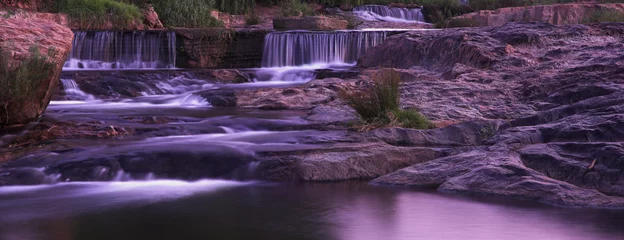 Wasserfall-Sonnenuntergang-Panorama © StockMasters