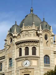 Fototapeta na wymiar building with clock and domes
