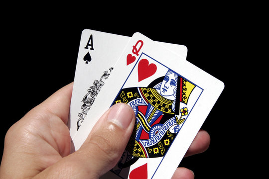 gambling cards in hand