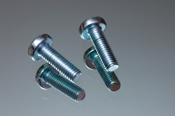 scew on a reflecting surface