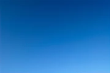 Deurstickers clear blue sky © Pippa West