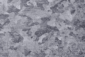 mottled scratched metal surface