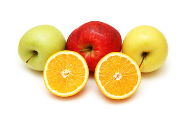 Fototapeta na wymiar half cut oranges and apples isolated on white