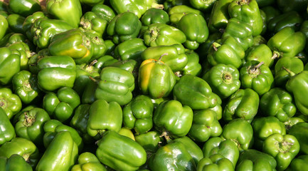 Plakat green peppers at a market