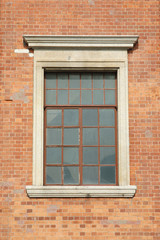 old window in brick wall